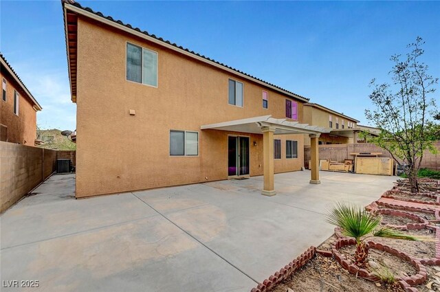 7216 Campolina Ct, Las Vegas, NV 89113 - rear view of property featuring a pergola, a fenced backyard, and stucco siding