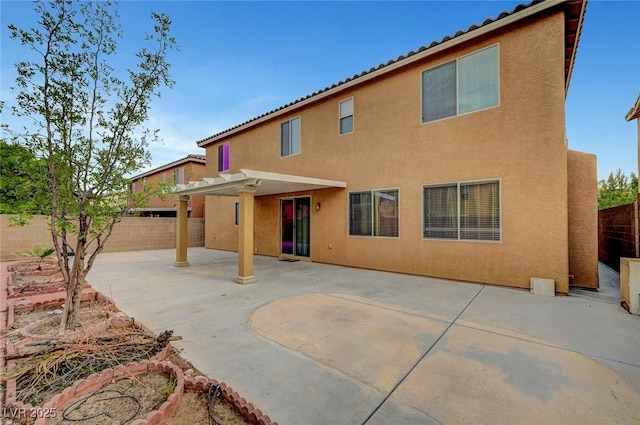 7216 Campolina Ct, Las Vegas, NV 89113 - back of property with a patio area, a fenced backyard, and stucco siding