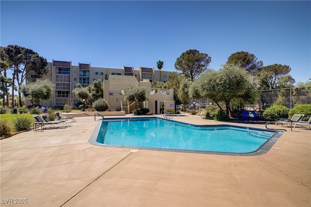 725 N Royal Crest Cir Unit 214, Las Vegas, NV 89169 - community pool featuring a patio area