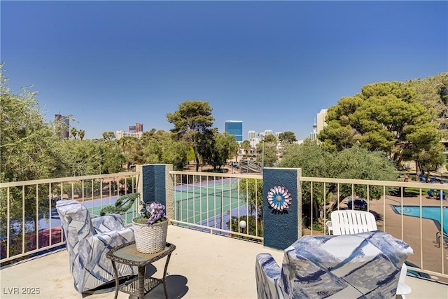 725 N Royal Crest Cir Unit 214, Las Vegas, NV 89169 - balcony with view of pool area