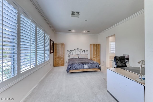 bedroom with ornamental molding, visible vents, baseboards, and carpet