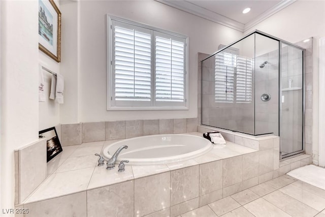 full bathroom with a stall shower, a garden tub, ornamental molding, and tile patterned floors