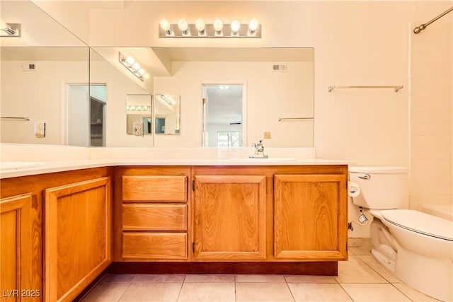 full bathroom with toilet, visible vents, tile patterned floors, and double vanity