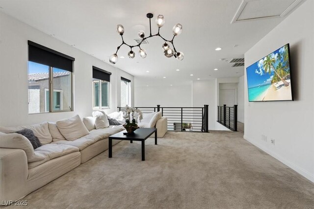 carpeted living area featuring visible vents and recessed lighting