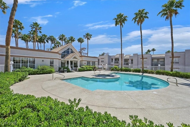 6800 E Lake Mead Blvd Unit 2050, Las Vegas, NV 89156 - community pool with fence, a patio area, and a hot tub