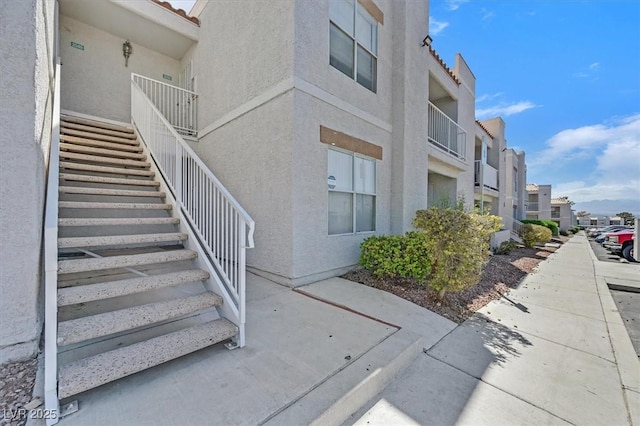 6800 E Lake Mead Blvd Unit 2050, Las Vegas, NV 89156 - view of property with stairway and a residential view
