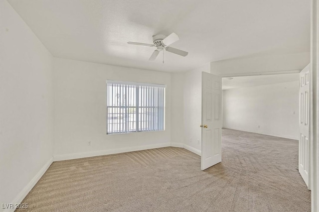 6800 E Lake Mead Blvd Unit 2050, Las Vegas, NV 89156 - carpeted spare room with a ceiling fan and baseboards