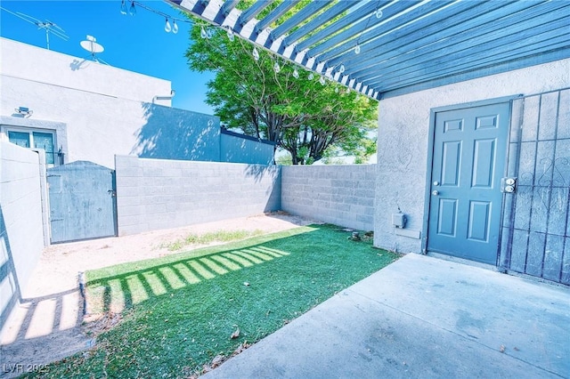 exterior space with a pergola, fence private yard, and a gate
