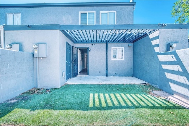 view of patio featuring fence