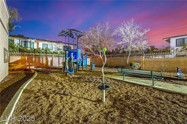 community jungle gym featuring fence
