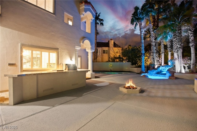 2608 Sun Reef Rd, Las Vegas, NV 89128 - exterior space featuring fence, a fire pit, and area for grilling