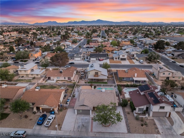 aerial view featuring a mountain view and a residential view