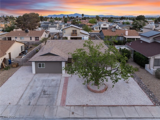 aerial view with a mountain view and a residential view