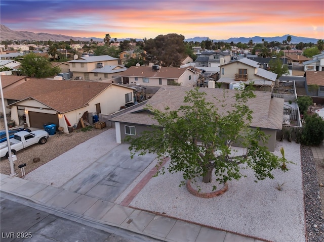 bird's eye view featuring a mountain view and a residential view