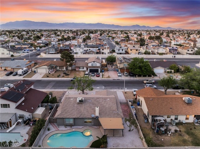bird's eye view featuring a mountain view and a residential view