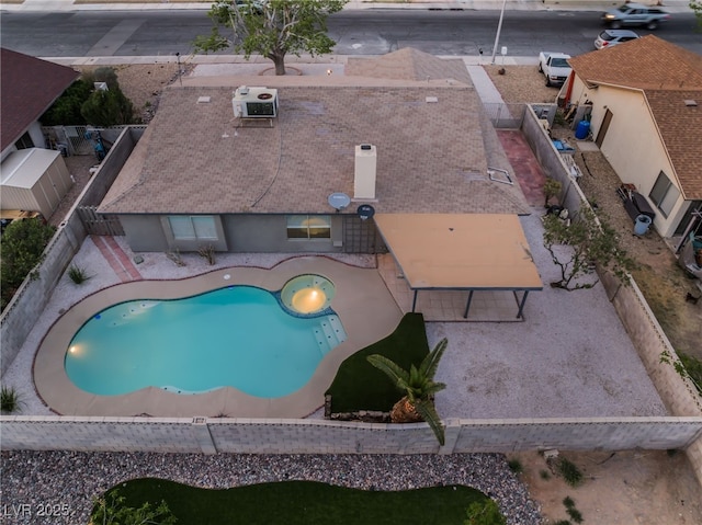 view of swimming pool with a fenced backyard