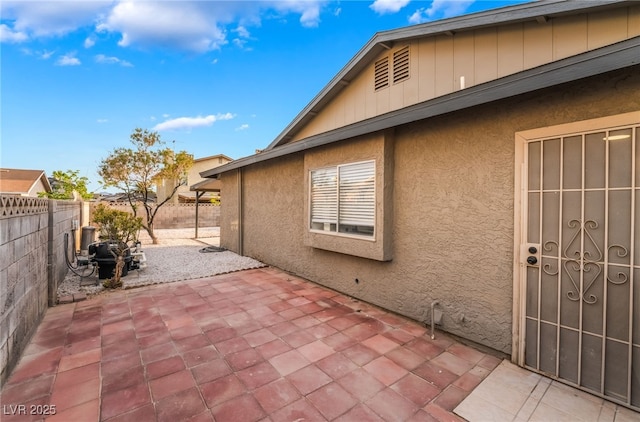 view of patio with fence