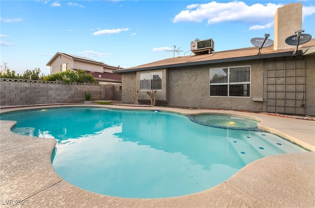 view of swimming pool with a pool with connected hot tub, central AC, and fence