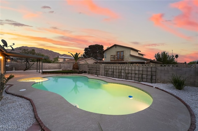 view of pool featuring a fenced backyard, a fenced in pool, and a patio