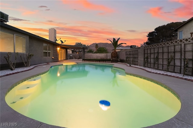 view of pool with a fenced backyard and a fenced in pool