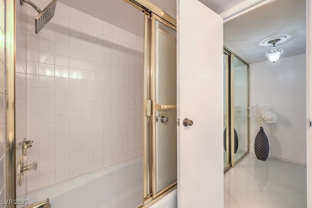 205 E Harmon Ave Unit 803, Las Vegas, NV 89169 - full bathroom featuring bath / shower combo with glass door and tile patterned floors