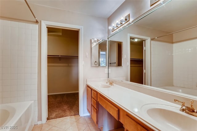bathroom featuring double vanity, a sink, tile patterned flooring, and shower / bathing tub combination