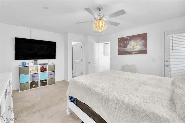 bedroom with baseboards, a ceiling fan, and carpet flooring