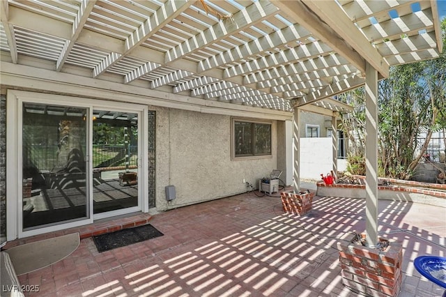 view of patio with fence and a pergola