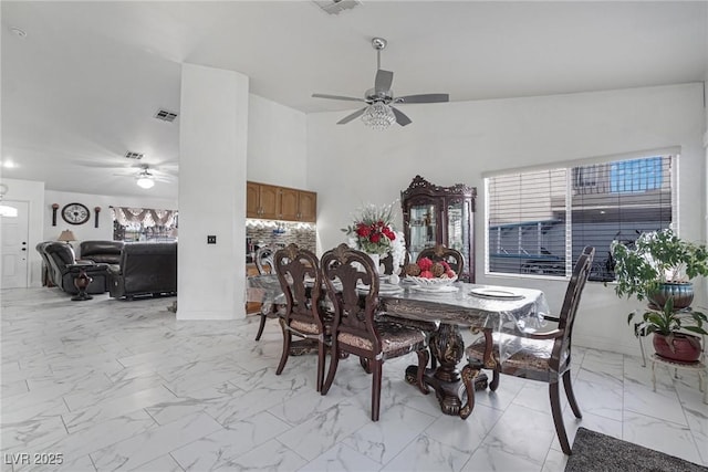 182 Horizon View Dr, Henderson, NV 89015 - dining room featuring ceiling fan, marble finish floor, and visible vents