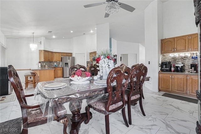 182 Horizon View Dr, Henderson, NV 89015 - dining room with marble finish floor, recessed lighting, ceiling fan, and a high ceiling