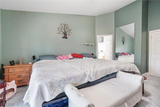 182 Horizon View Dr, Henderson, NV 89015 - bedroom with lofted ceiling and marble finish floor