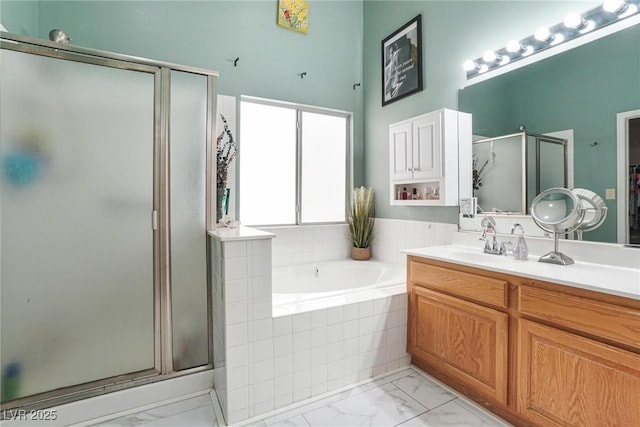 182 Horizon View Dr, Henderson, NV 89015 - full bathroom featuring a bath, vanity, marble finish floor, and a stall shower