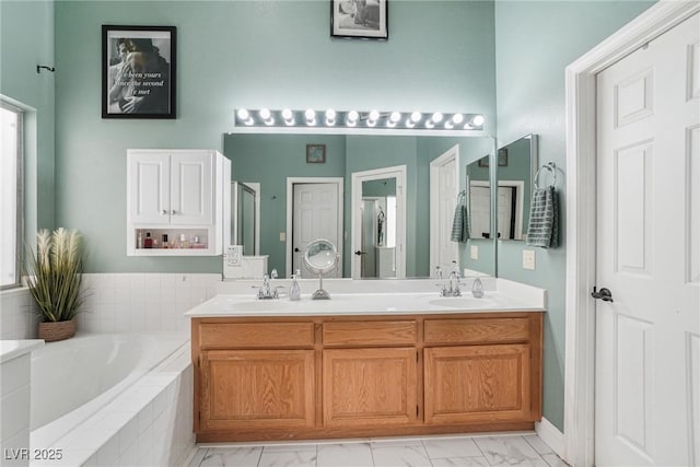 182 Horizon View Dr, Henderson, NV 89015 - full bath with double vanity, a garden tub, a stall shower, a sink, and marble finish floor