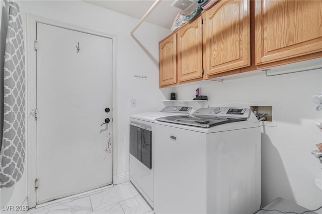 182 Horizon View Dr, Henderson, NV 89015 - laundry room featuring cabinet space, washing machine and clothes dryer, visible vents, and marble finish floor
