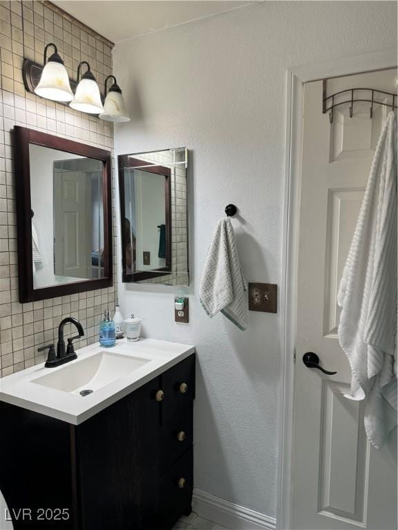 182 Horizon View Dr, Henderson, NV 89015 - bathroom with baseboards, tasteful backsplash, and vanity