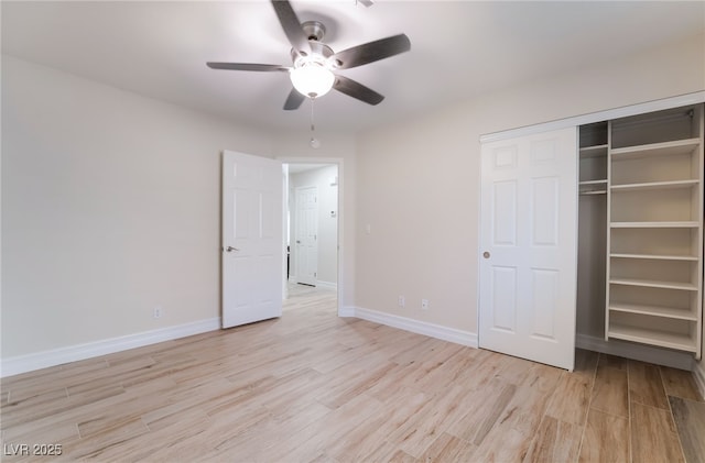 unfurnished bedroom with a closet, baseboards, light wood finished floors, and ceiling fan