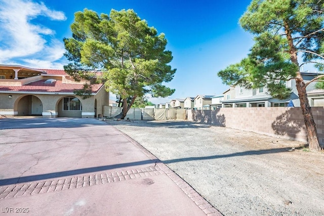 1410 E Serene Ave, Las Vegas, NV 89123 - exterior space featuring fence and a residential view