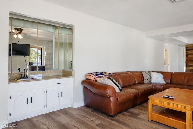1410 E Serene Ave, Las Vegas, NV 89123 - living area with ceiling fan, wood finished floors, and baseboards