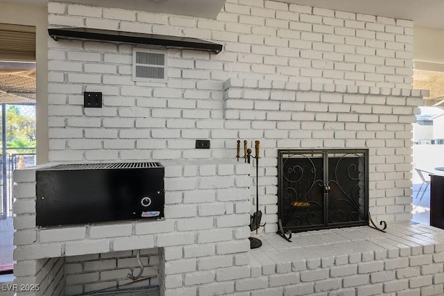 1410 E Serene Ave, Las Vegas, NV 89123 - detailed view of a brick fireplace