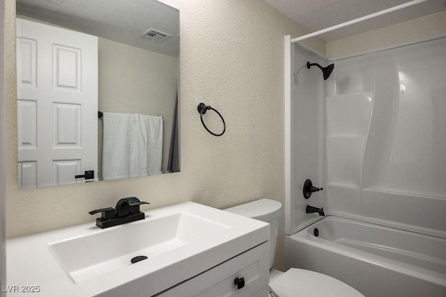 1410 E Serene Ave, Las Vegas, NV 89123 - bathroom featuring toilet, shower / bathtub combination, a textured wall, vanity, and visible vents