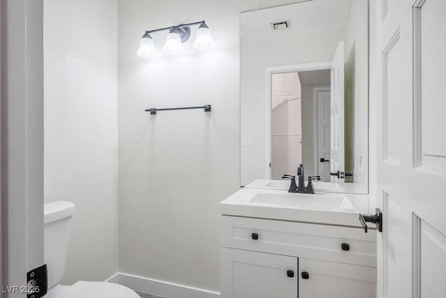 1410 E Serene Ave, Las Vegas, NV 89123 - bathroom featuring visible vents, toilet, and vanity