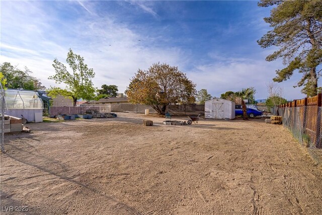 3100 Garehime St, Las Vegas, NV 89108 - fenced yard featuring a storage unit