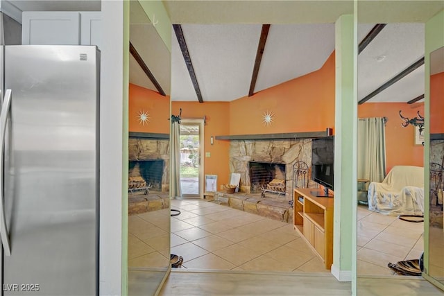 3100 Garehime St, Las Vegas, NV 89108 - tiled living room featuring a stone fireplace, beam ceiling, and high vaulted ceiling
