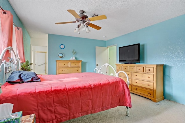 3100 Garehime St, Las Vegas, NV 89108 - carpeted bedroom with ceiling fan and a textured ceiling