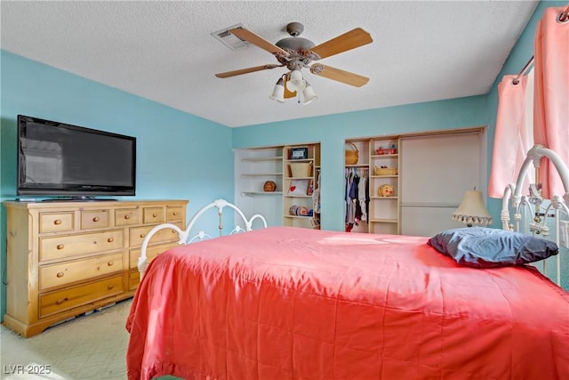 3100 Garehime St, Las Vegas, NV 89108 - carpeted bedroom with a textured ceiling and a ceiling fan