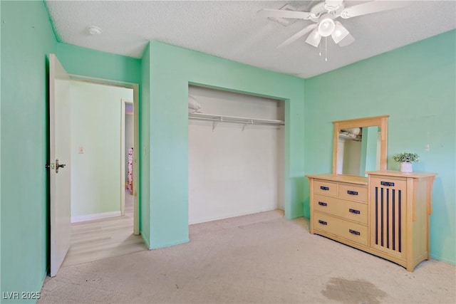 3100 Garehime St, Las Vegas, NV 89108 - bedroom with carpet flooring, a closet, a ceiling fan, and a textured ceiling