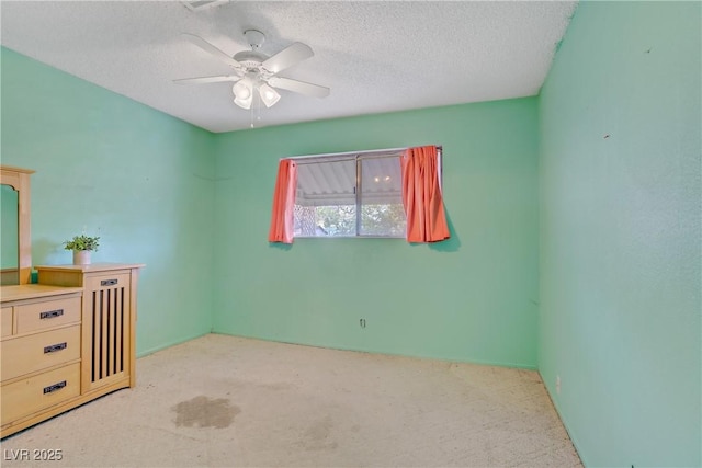 3100 Garehime St, Las Vegas, NV 89108 - unfurnished bedroom with carpet floors, a textured ceiling, and a ceiling fan