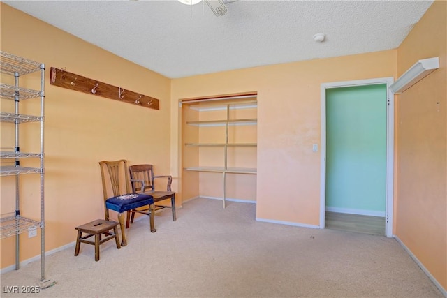 3100 Garehime St, Las Vegas, NV 89108 - sitting room featuring carpet, a textured ceiling, and baseboards