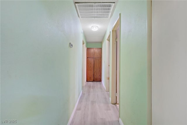 3100 Garehime St, Las Vegas, NV 89108 - hallway with light wood finished floors and baseboards
