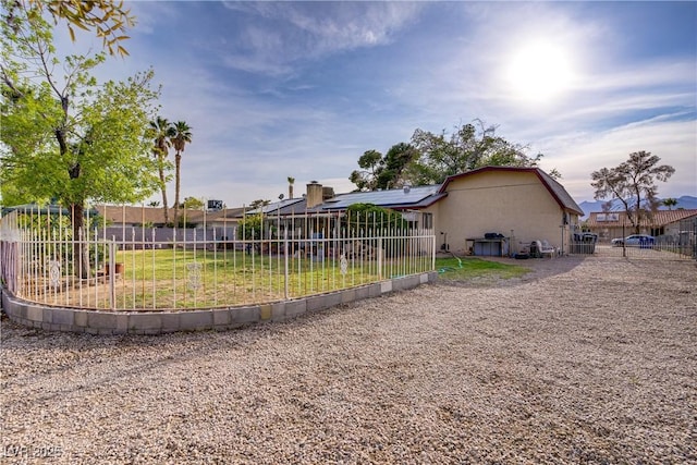 3100 Garehime St, Las Vegas, NV 89108 - rear view of house featuring solar panels